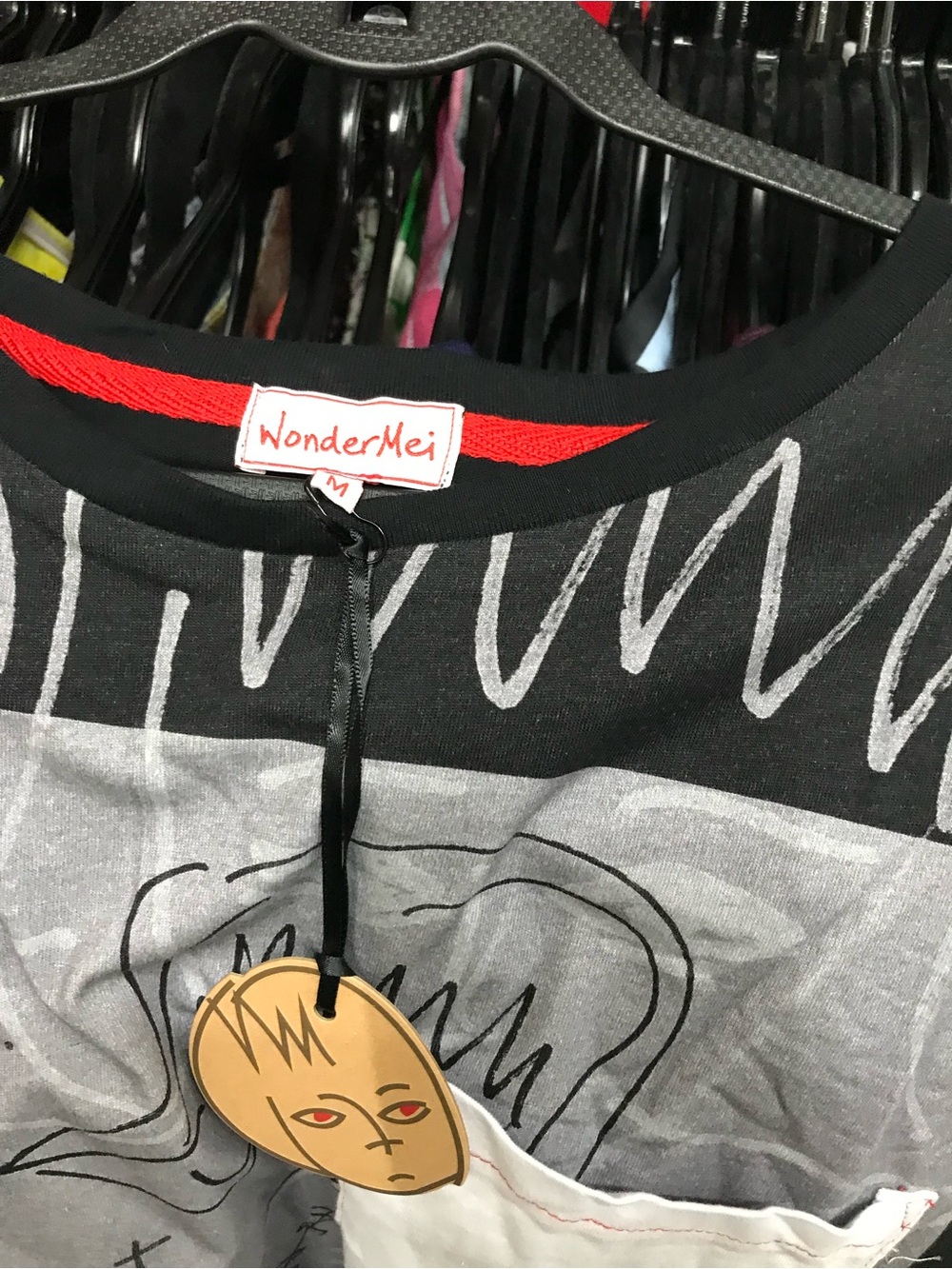 Wonder Mei Black Graphic Short Sleeve Tee with Contrast Pocket - Picture 3 of 3